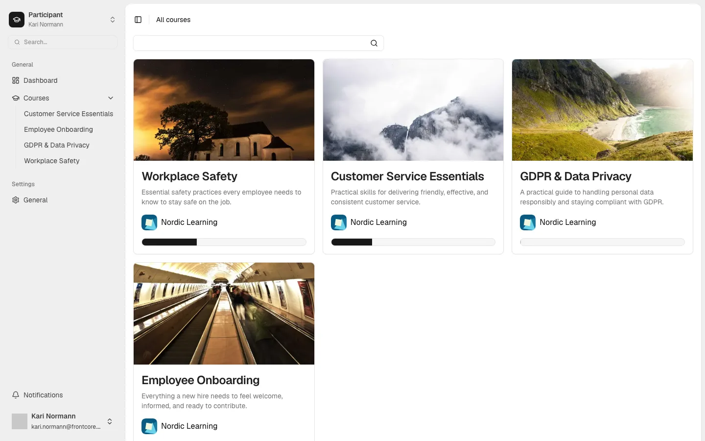 The All courses page showing a grid of four enrolled course cards, each with a cover image, description, organization name, and progress bar