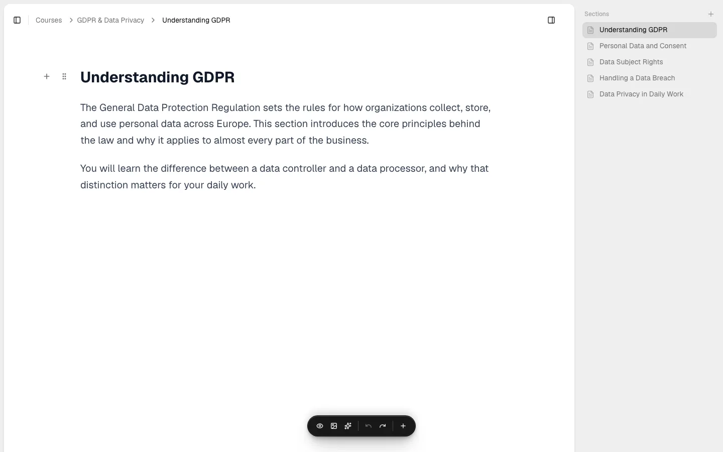 A section editor showing the "Understanding GDPR" section before any test block has been added, with its existing paragraphs and the floating toolbar at the bottom